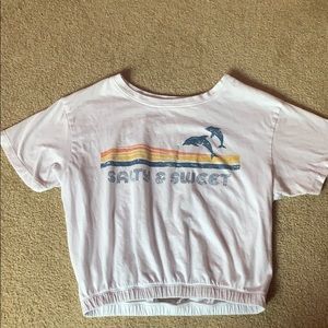 White crop top with words salty and sweet on it!
